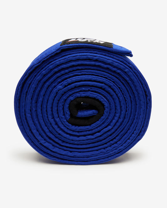 Roll of blue fabric with a black strap on a white background on it's side