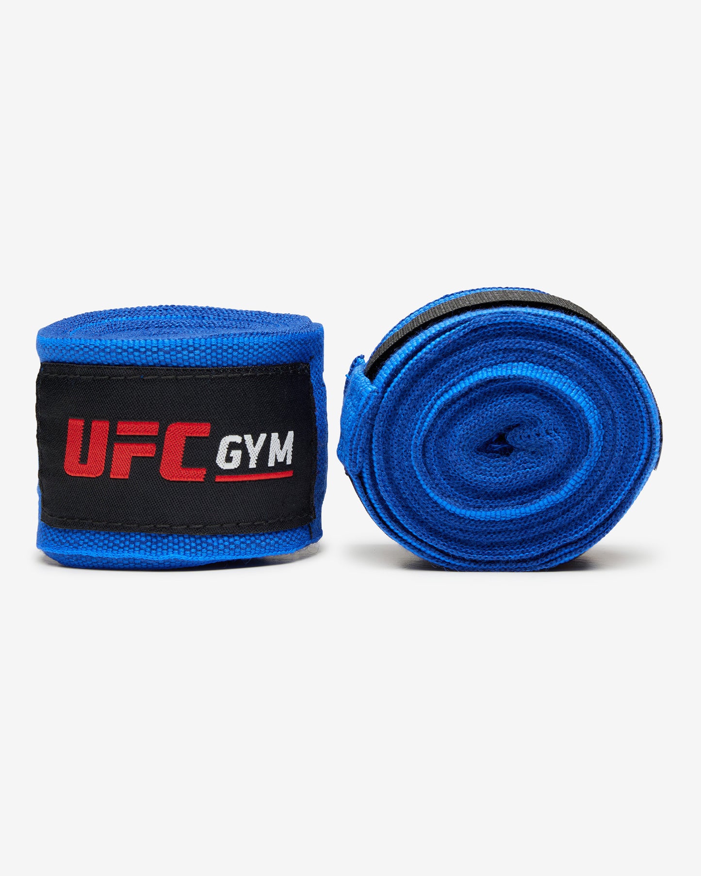 The UFC Gym TD 180 HAND WRAPS BLUE are blue hand wraps with black ends and Velcro, inspired by MMA gear to enhance grip during weightlifting—a must-have for fighters—shown on a white background.