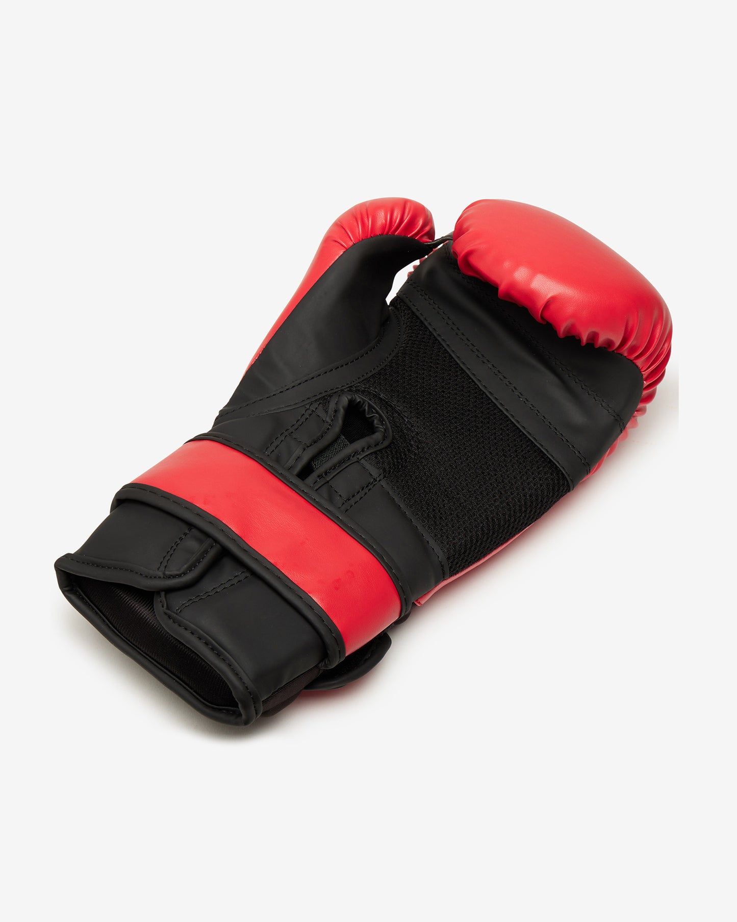 Red and black boxing glove on a white background
