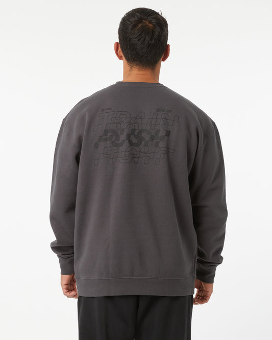 Person wearing a dark gray sweatshirt with text on the back against a white background
