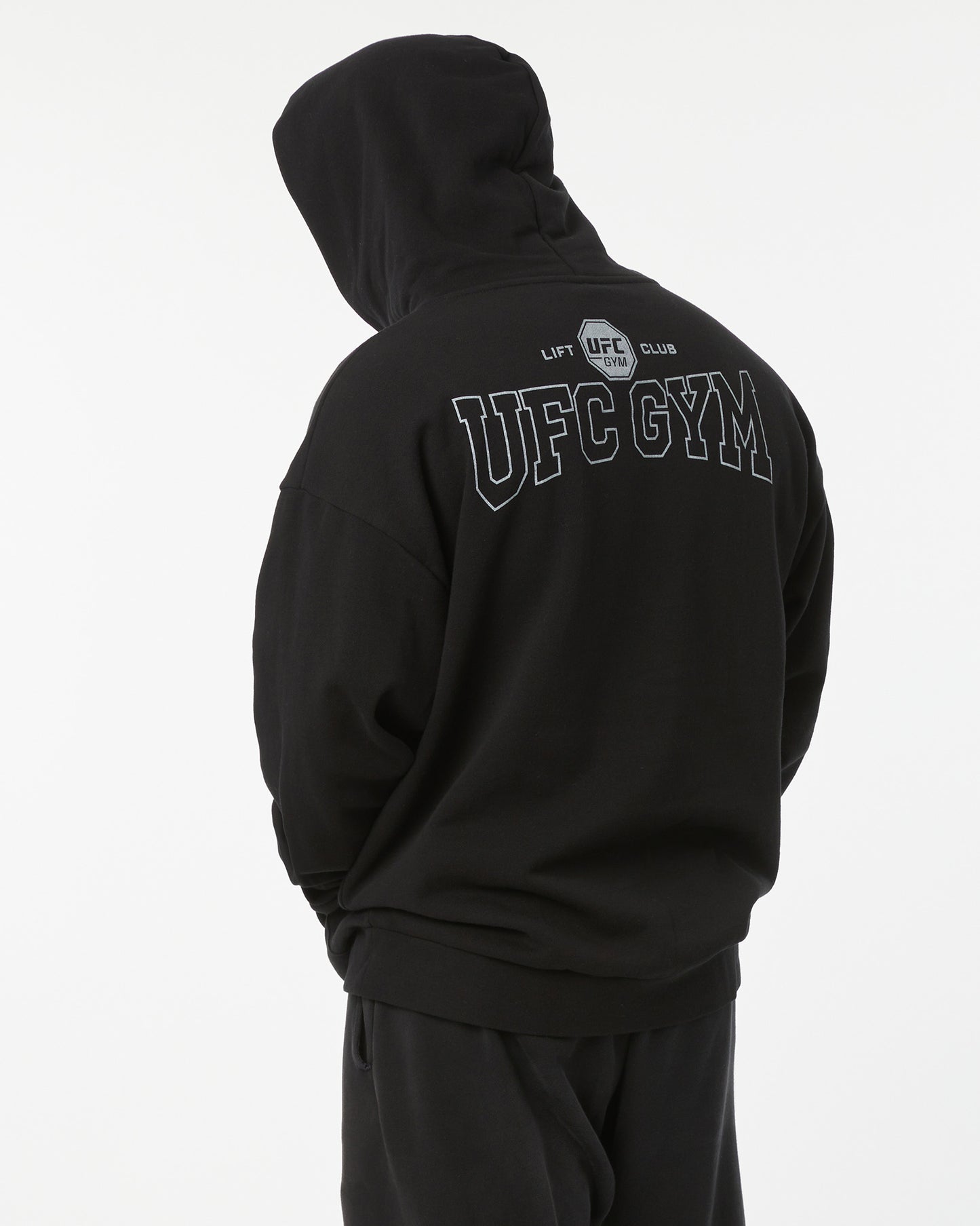 Black hoodie with 'UFC Gym' and 'LIFT CLUB' text on the back against a white background