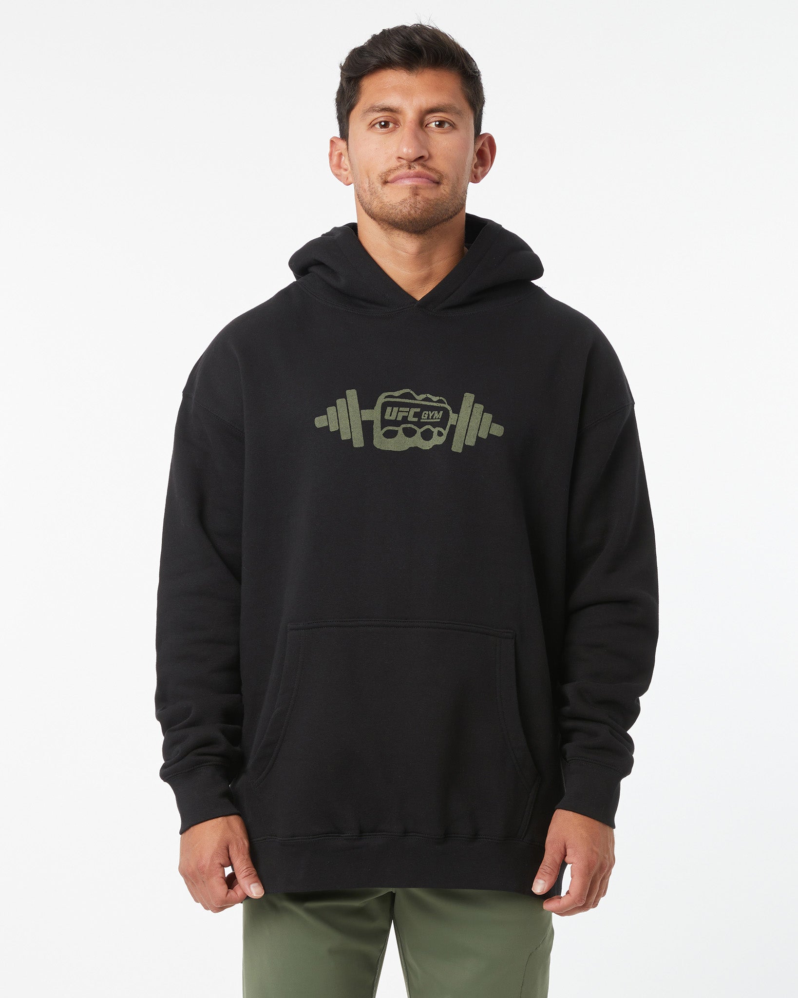 Man wearing a black hoodie with a logo on a white background