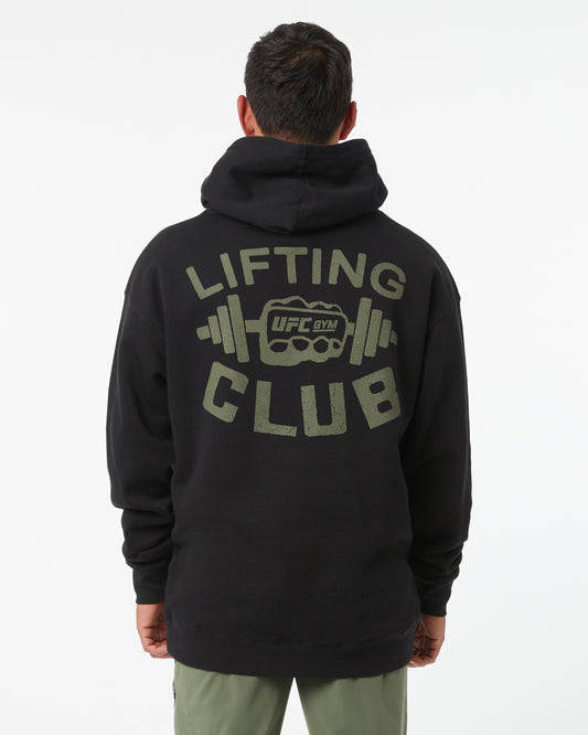 Person wearing a black hoodie with 'Lifting Club' text and UFC logo on the back.