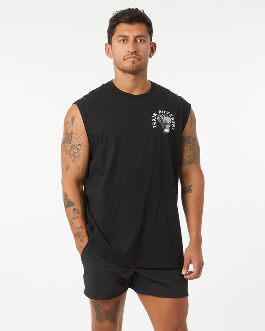 Man wearing a black sleeveless shirt with a logo on a white background