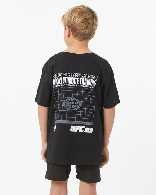 Child wearing a black UFC t-shirt with graphics on the back against a white background facing backward