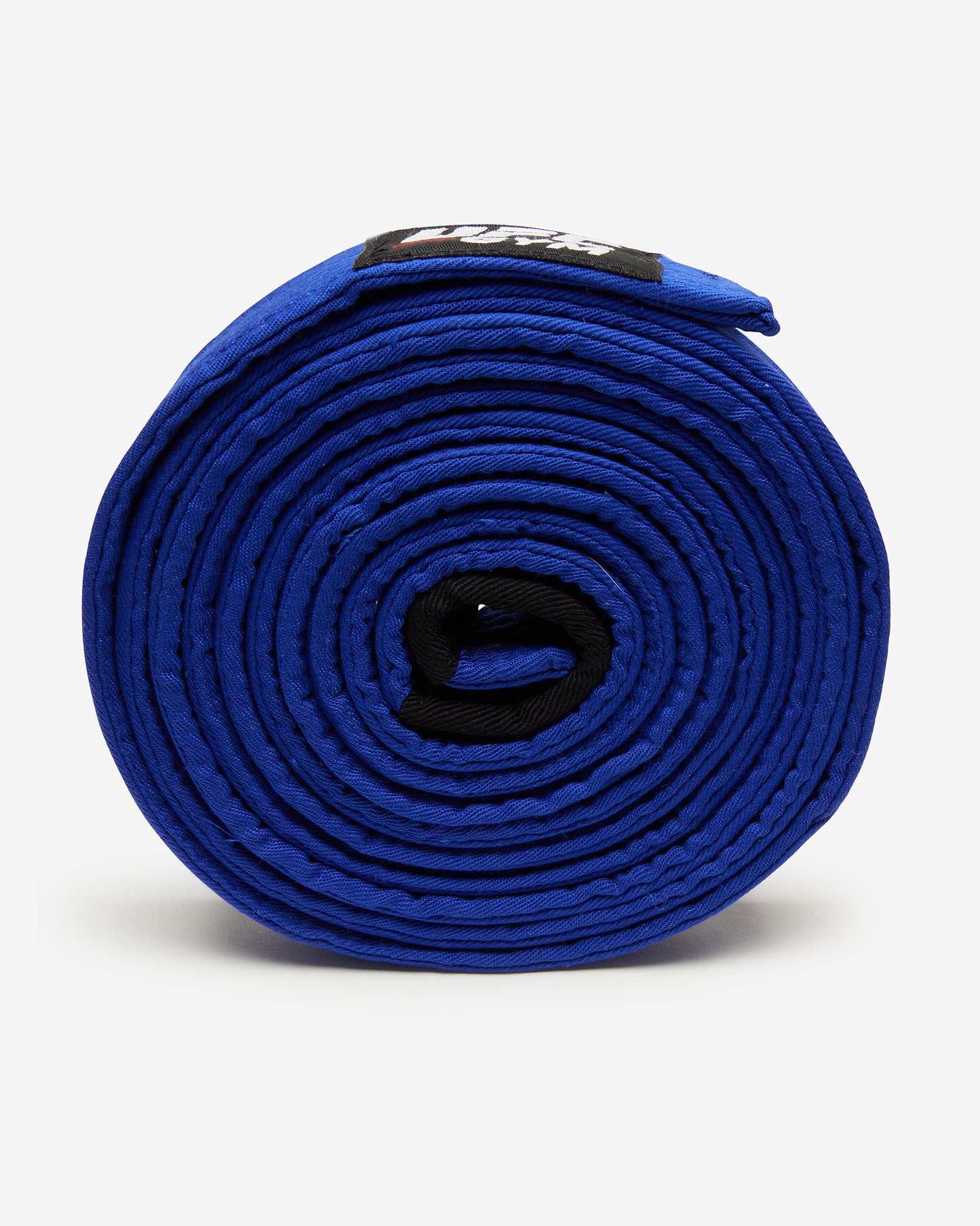 Roll of blue fabric with a black strap on a white background on it's side