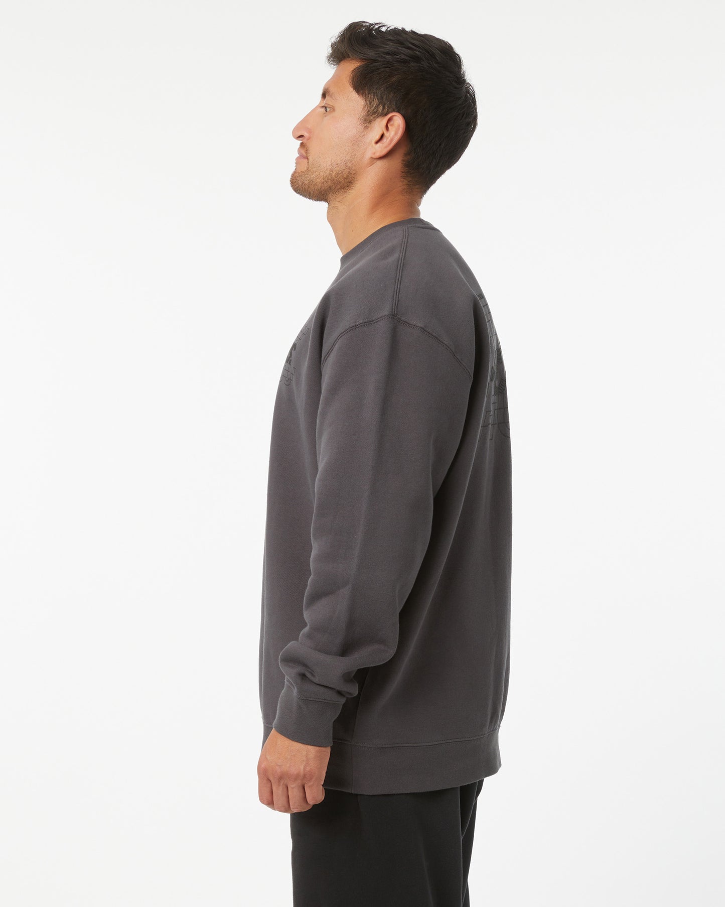 Man wearing a gray sweatshirt on a white background